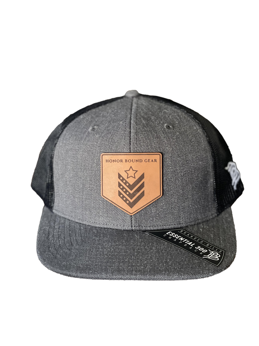 HBG Branded Bills Trucker Hat - Dark Grey with Brown Leather Patch